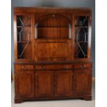 Large mahogany effect cabinet, the top flanked with glazed doors either side and centred with a drop