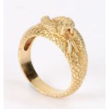Gold snake ring with small diamond set eyes, ring size V, 11.8g