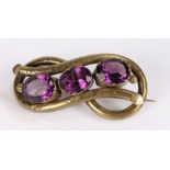 Gilt metal bracelet set with three amethysts, 61mm wide, 19.4g