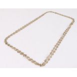 9 carat gold necklace set with clear paste, 156cm long, 29.5g