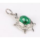 18 carat white gold, emerald and diamond pendant in the form of a tortoise, the carapace set with an