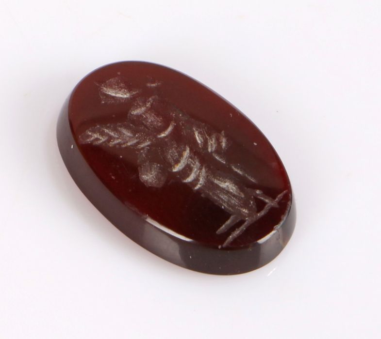 Oval carnelian intaglio, carved with a figure, 8.5ct