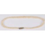 Two strand graduated pearl necklace, with 9 carat white gold clasp, 27g