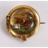 Essex Crystal brooch, of horse racing interest, a Jockey in a steeple chase with a belt surround,