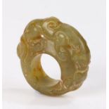 Jade ring carved with depiction of a mythical dog, 50.4g