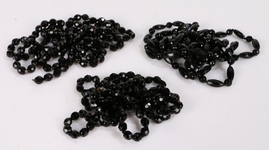 Three jet bead necklaces, with facet cut beads, 136cm long, 98cm long and 116cm long (3)