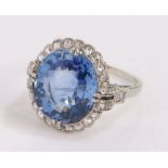 Fine and impressive sapphire and diamond set ring, the central sapphire at an estimated 9.63