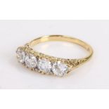 18 carat gold ring set with four diamonds interspersed with diamond chips, diamond weight 1.61ct,