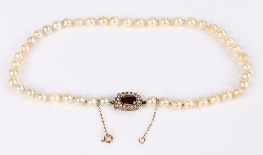 Pearl necklace, with garnet and pearl set clasp, 43cm long, 29.6g
