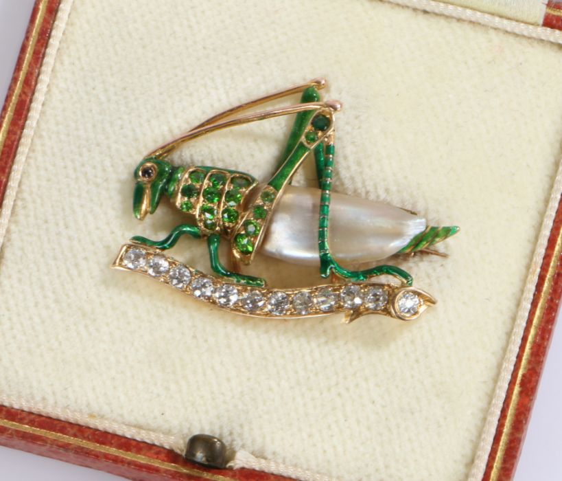 Demantoid Garnet , diamond and mother of pearl and brooch in the form of a grasshopper, 33mm wide,