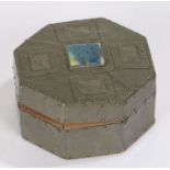 Arts and Crafts style pewter and enamel box, of octagonal form, the hinged lid centred with a square