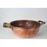 20th century copper and wooden handled dairy pot, 39.5cm diameter