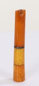 Art Deco style amber cheroot holder, inset with a band of sapphires, 8.5cm long