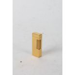 Mid 20th Century Dunhill yellow metal lighter, 6.5cm high
