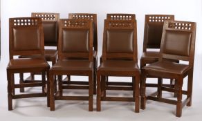 Derek "Lizardman" Slater set of eight oak dining chairs, each with a carved lattice top above a