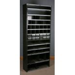 N.C. Brown Ltd, large green metal pigeon holed shelves, fitted with a series of small drawers, 216cm