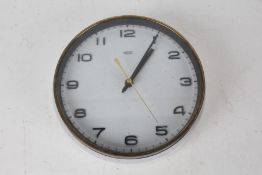 Metamec wall clock, with white surround and arabic numerals, battery powered, 22cm diameter