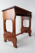 20th Century Art Nouveau style stained oak organ stool, 58cm wide and 55cm high