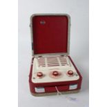 Ever Ready 'sky baby' portable radio, with hinged lid and side clasps, 22.5cm wide