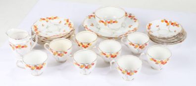 Art Deco tea set, by Diamond China Ltd., decorated in a brightly coloured Art Deco pattern,