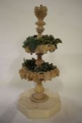 Continental style two tier carved alabaster tazza, with acanthus decoration and faux grapes,