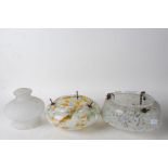 Three various Art Deco mottled glass light shades, two of circular form, the other with a frilled