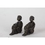 Pair of Art Deco spelter figures, each in the form of a seated lady, with registration marks, each