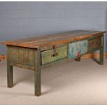 Early to Mid -20th century pine work bench/counter, the pine planked top above a green painted
