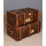 Two early 20th Century wood and brass bound travelling trunks, one marked the Crescent with a