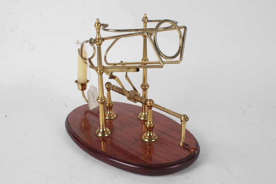 20th century brass and mahogany decanter stand, with candle sconce, 33cm wide