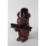 Novelty carved wooden brush stand, in the form of a squirrel, 24cm high