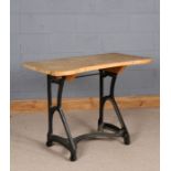 20th Century pine topped industrial type table, raised on a metal framed support with castors, 102cm