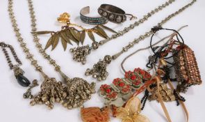 Collection of costume jewellery to include necklaces and bracelets housed in a box (Qty)