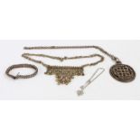 Collection of metal jewellery to include a medallion depicting snakes signed Yvonne Tindas of Paris,