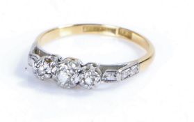 18 carat gold ring, with three platinum set diamond chips, ring size L, 2.4g