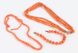 Two Coral necklaces, one consists of three rows of beads, together with a coral bracelet (3)