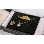 Gold plated and Cubic Zirconia necklace and earring set housed in a case - 13.08.2 Vendor to