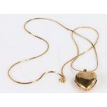 9 carat gold locket of heart form, on a 9 carat gold necklace, 5.4g