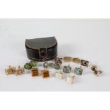 Nine pairs of cufflinks to include tigers eye and gilt metal examples (18)