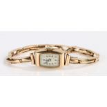 Pinnacle 9 carat gold cased ladies wristwatch, the signed silver dial with Arabic markers and