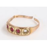 15 Carat Gold ring, with three rubies (one stone missing), gross weight 2.2g