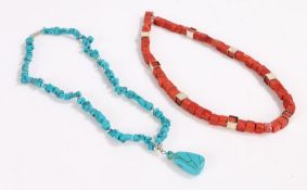 Two necklaces one of coral the other of blue colourings carved into cubes (2)