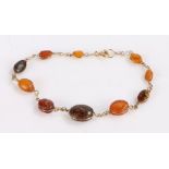 18 carat gold and amber set bracelet, with graduated amber beads, 19.5cm long