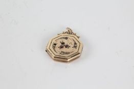 Gold plated octagonal locket set with clear and red paste, 22mm wide