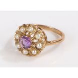 9 carat gold ring set with a central amethyst surrounded by eight pearls, ring size P, 3.6g