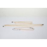 Simulated pearl necklace with a silver clasp together with two other pearl necklaces (3)