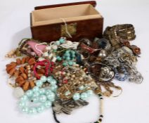 Collection of costume jewellery to include necklaces, bracelets and a watch housed in wooden box (