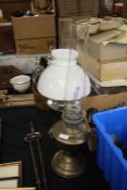 Two Oil lamps onw with a opaque glass shade, 30cm tall