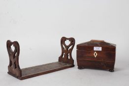 19th century rosewood and boxwood tea caddy, the hinged lid enclosing two compartments and raised on