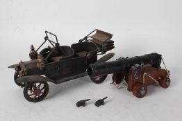 Metal model of a 1920's car, 30cm wide, model cannon, two miniature cannon (4)